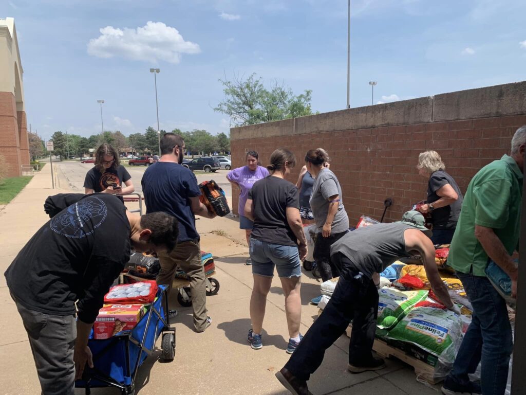 People helping with supplies